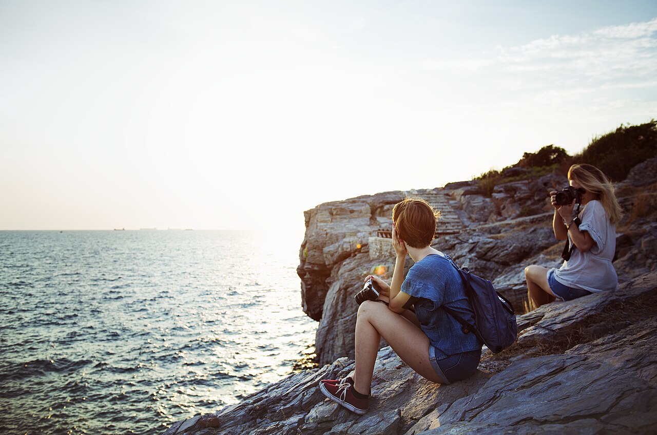 Reisende am Meer